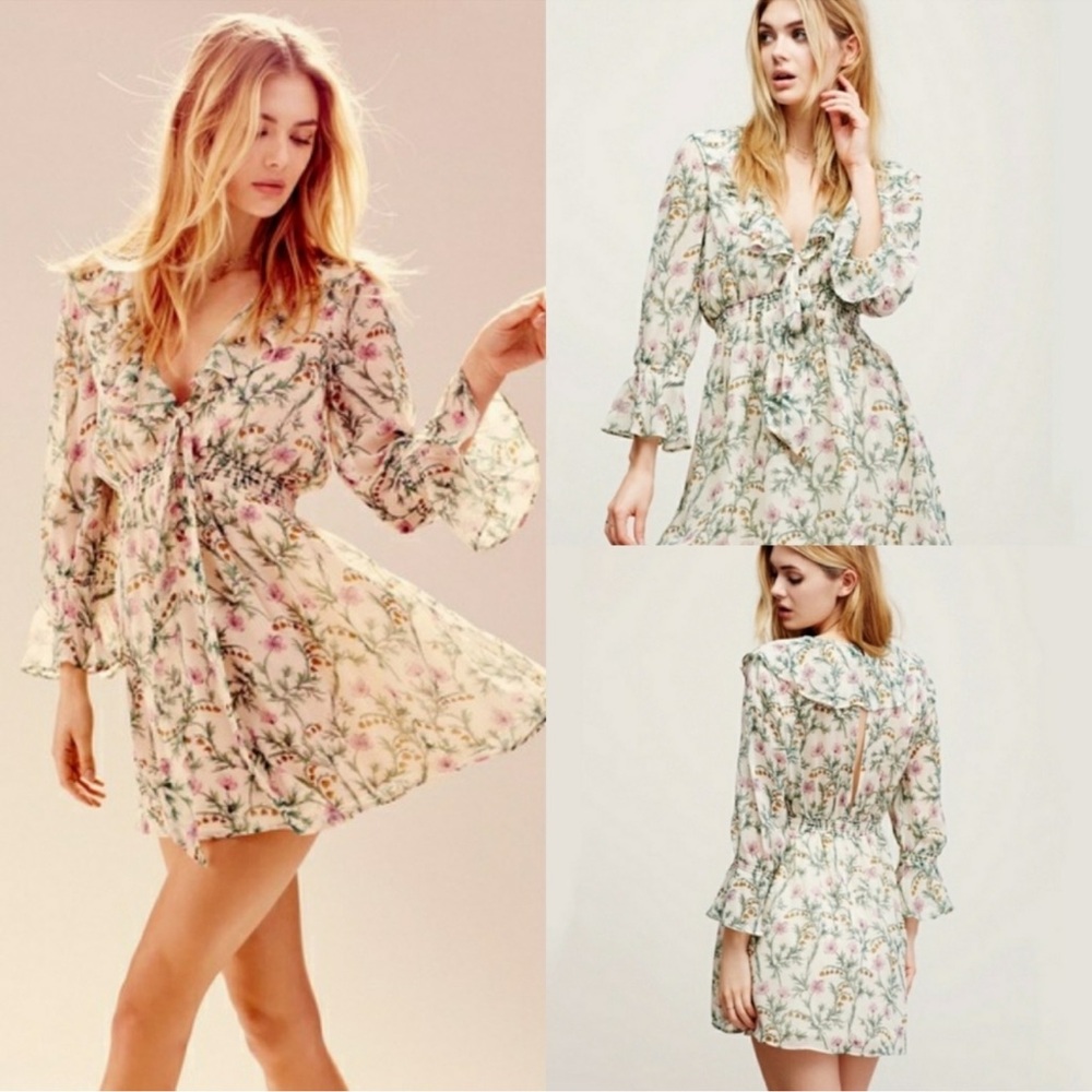 FREE PEOPLE Ditzy Floral Romantic Cream
Ruffle Swing Dress Size Small